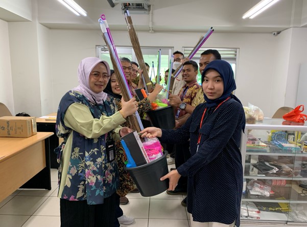 Distributing cleaning products and staple needs for employees affected by floods